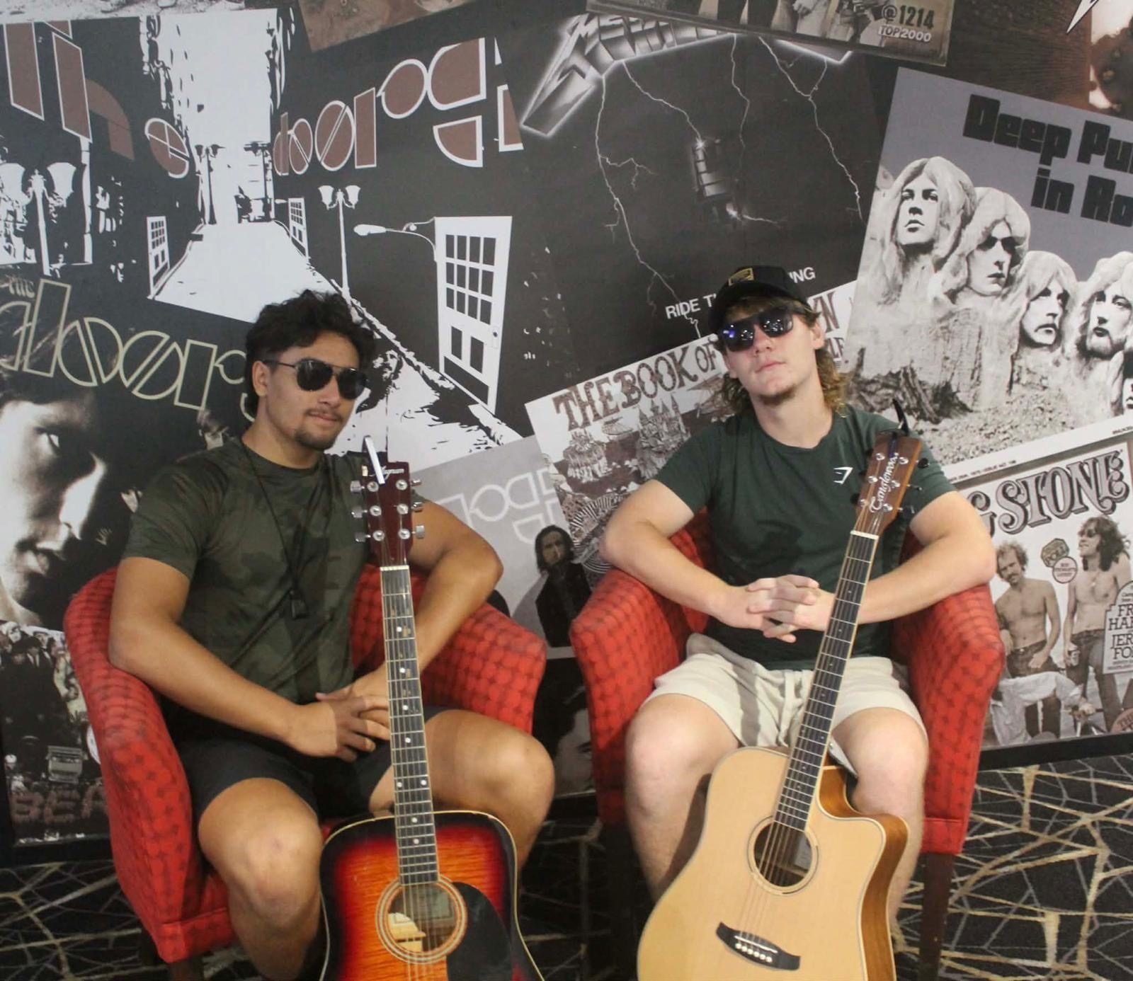 Two chairs, two guitars